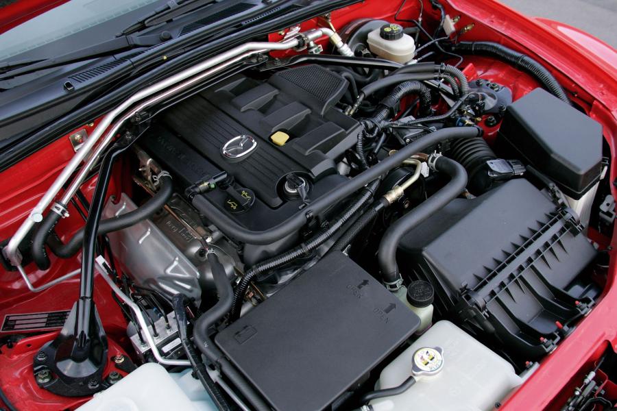  Mazda MX-5 Roadster Coupe 2006 года  (фото 33 из 212)